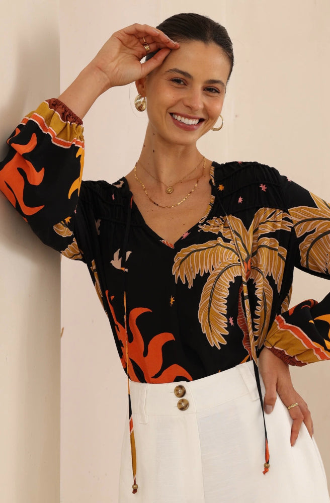 Sunspell Blouse, Long Sleeves, Hi Low Hem, Black Night Sky Print With Suns and Palm Trees