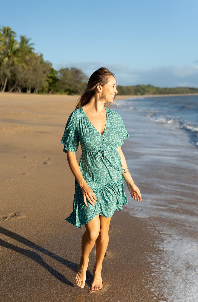 Teal Daisy Nicki Mini Dress, Front View with Relaxed Fit and Flutter Sleeves