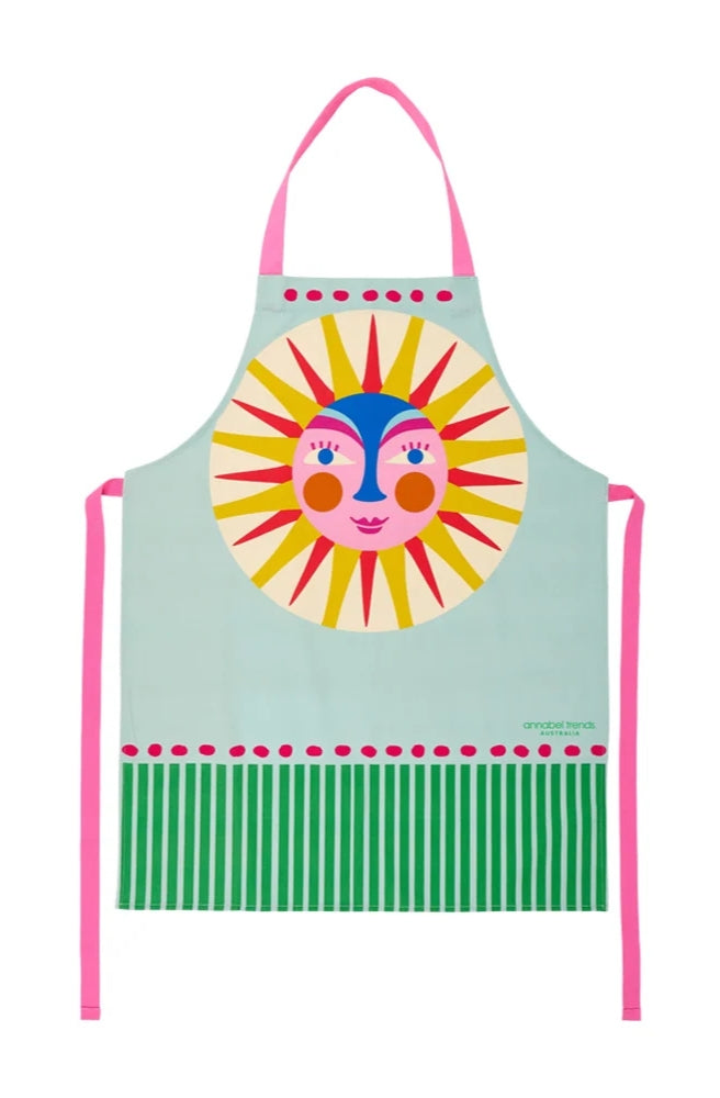 Apron Reg Printed – Fiesta Sun featuring a colourful sun illustration on a mint green background.