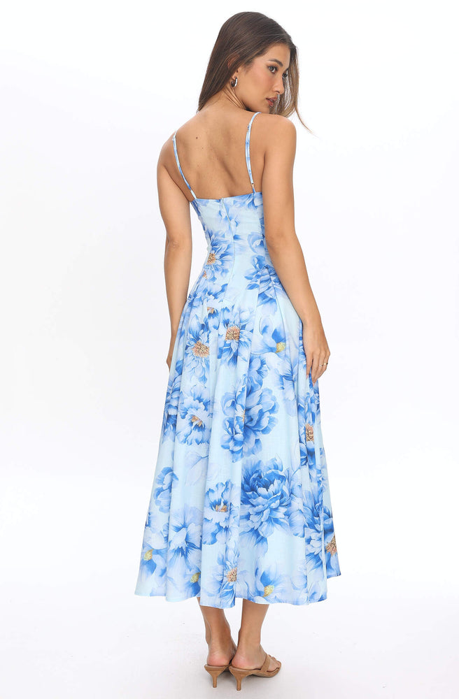 Back view of Tonketti Blue Peony slip maxi dress with adjustable straps and blue peony floral print.