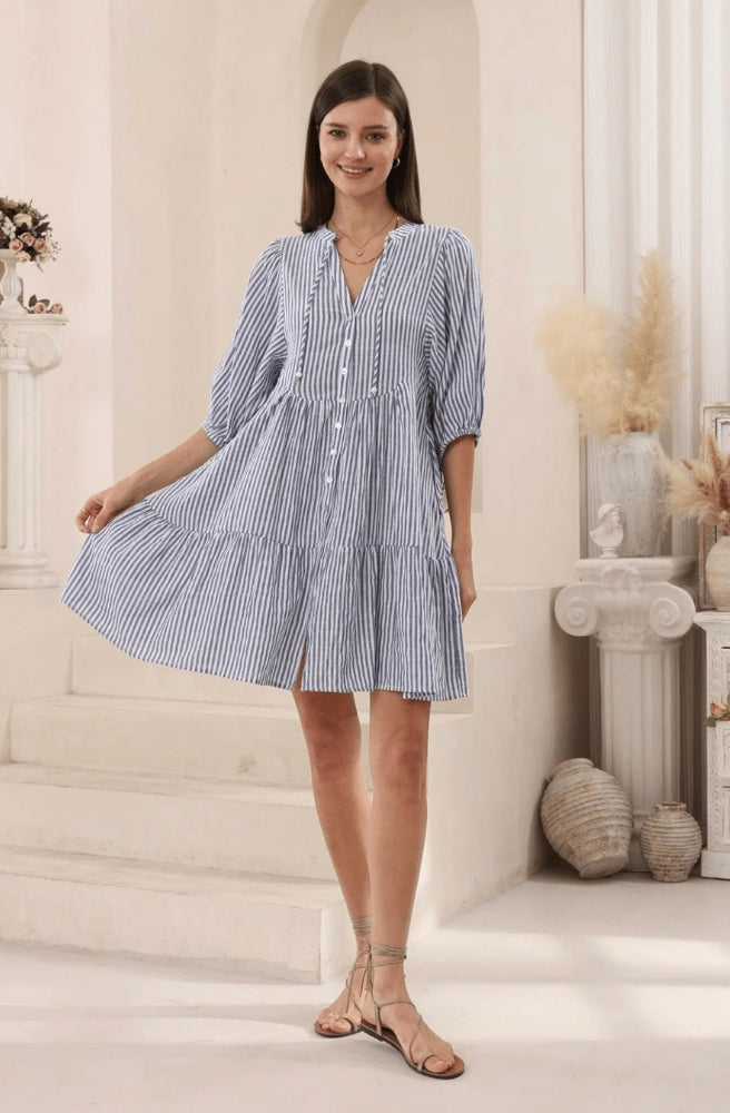 Blue striped babydoll dress with three-quarter balloon sleeves and flowing tiered skirt