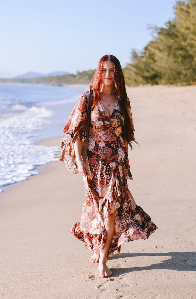 Boheme Plume Combi Wrap Dress featuring a flattering wrap silhouette and flowing skirt in chocolate, rust, cream and earthy tones.