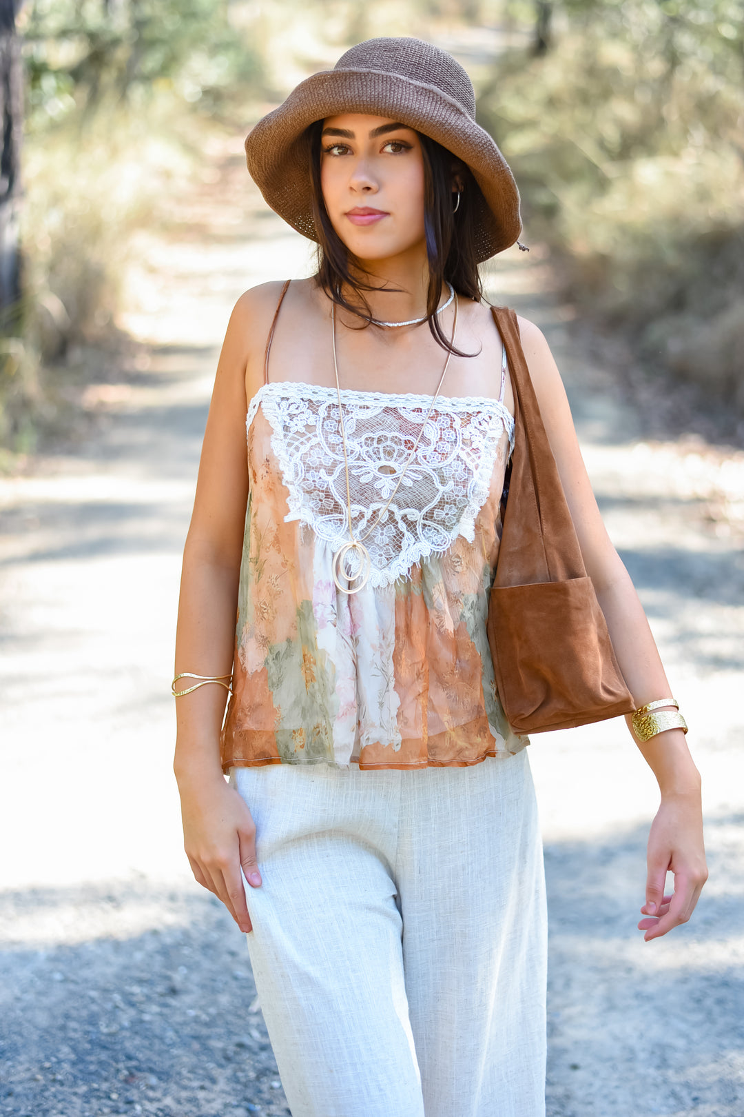 Botanical Lace Singlet with delicate lace front detail, botanical print and adjustable shoulder straps.