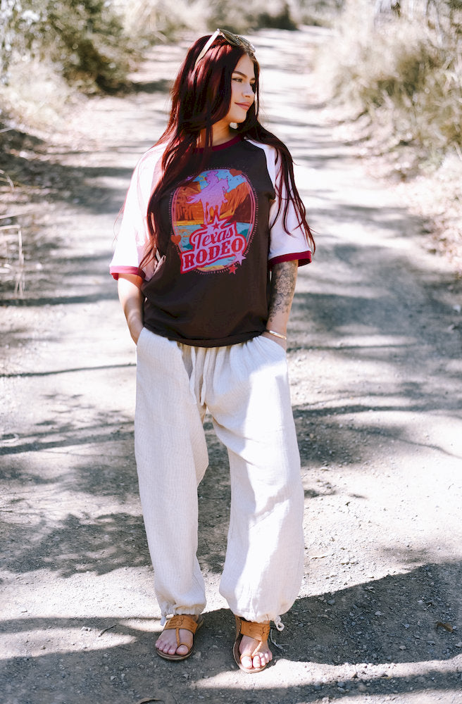 Choco Texas Rodeo Tee showing burgundy contrast trims and a relaxed western-inspired fit.
