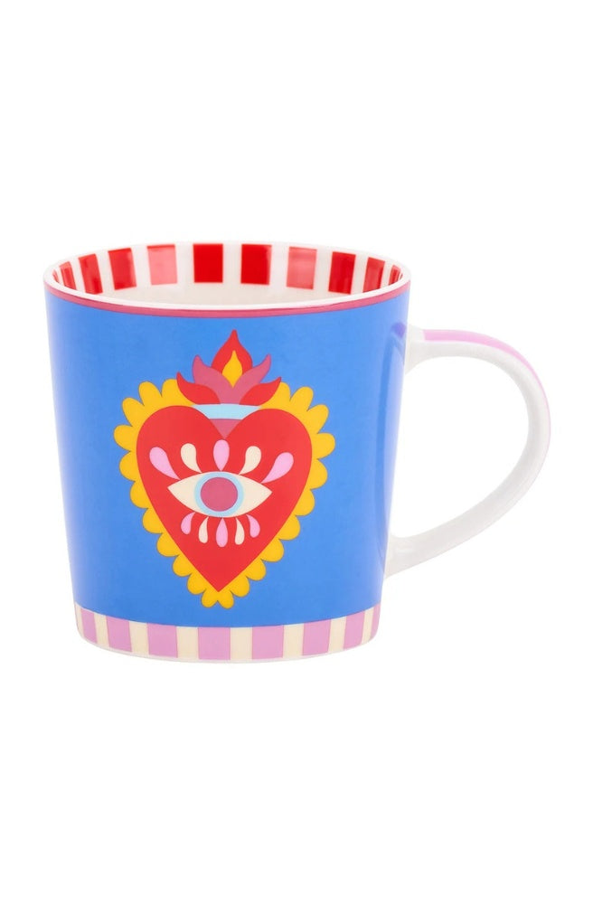 Coffee Mug – Fiesta Heart featuring a colourful heart and decorative eye illustration.