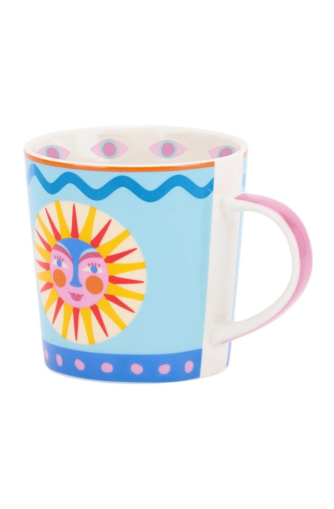 Coffee Mug – Fiesta Sun featuring a colourful sun illustration.