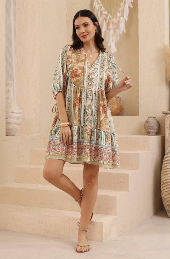Desert Heirloom Babydoll Dress with three-quarter sleeves, button-through bodice and decorative border print.