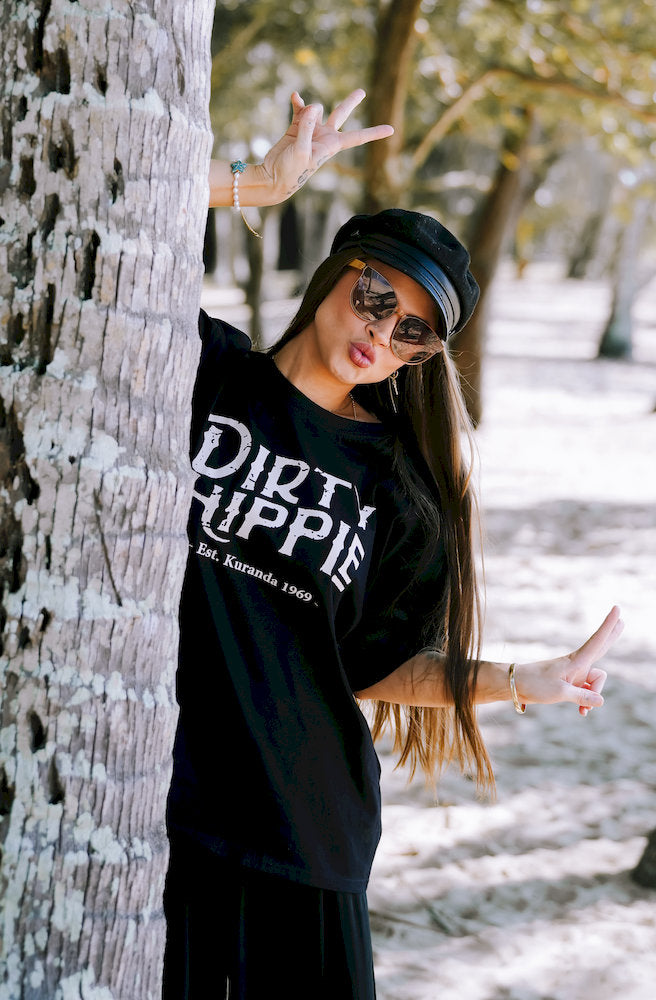 Dirty Hippie Outlaw Tee in black organic cotton with vintage distressed graphic and relaxed fit