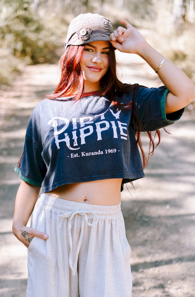 Close-up of the Dirty Hippy Crop Top highlighting the washed navy fabric and contrasting rust and teal trims.