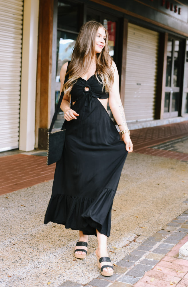 Ebony Julie Dress with halter ties, ruffle hem and elegant open-back design.