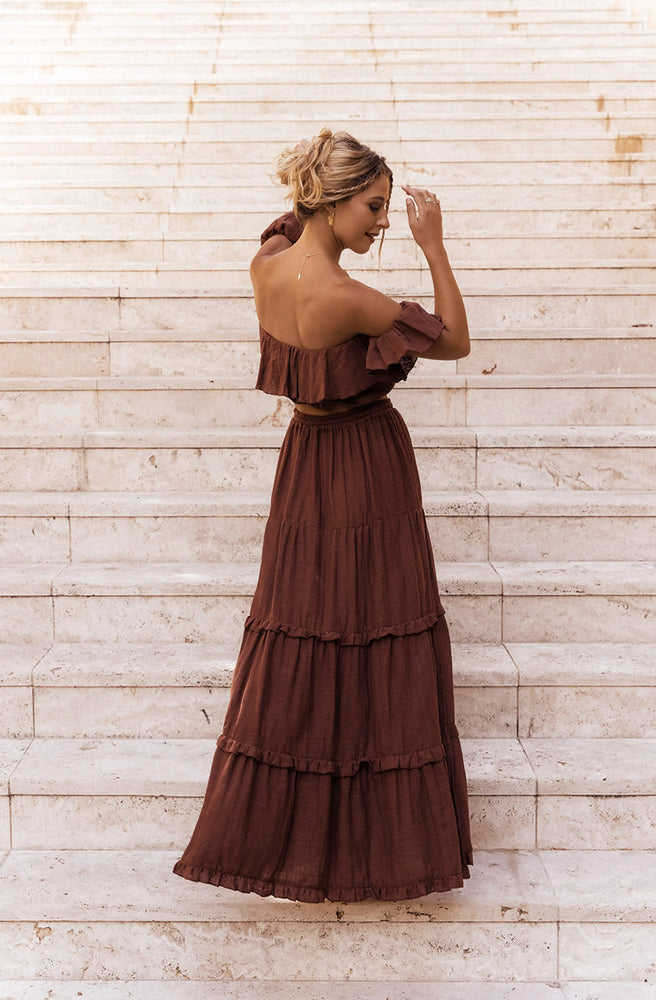 Esmeralda Chocolate Maxi Skirt styled with a cropped top for a relaxed boho summer look.