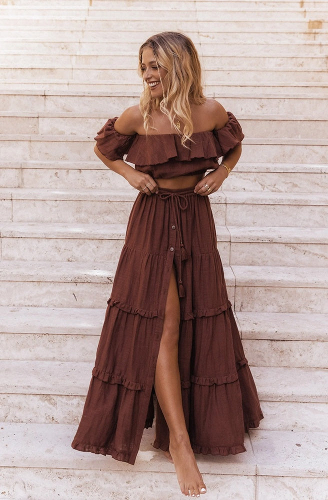 Esmeralda Chocolate Maxi Skirt in rich brown double cotton with a button front, side slits and tassel-tie waistband.