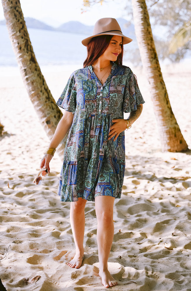 Women's Forest Patch Cherry Mini Dress with a flowing mini silhouette, V-neckline, button-front detail and effortless boho styling.