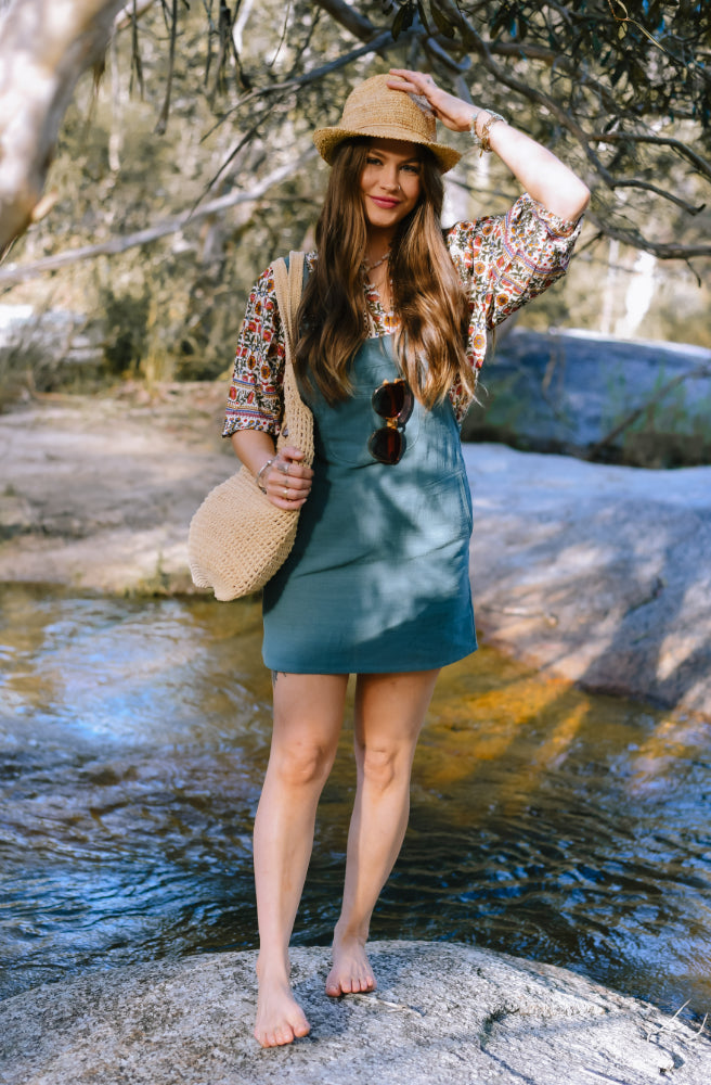 Gypsy Thread Pinafore Green close up textured cotton bib pocket detail