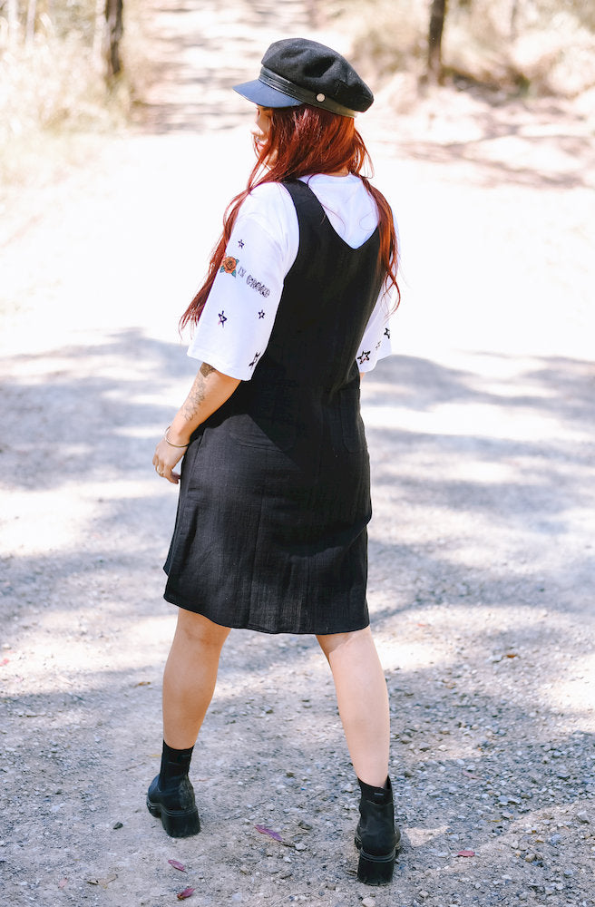 Back view of the Gypsy Thread Pinafore Mid Short Black showing the simple back design and relaxed fit.