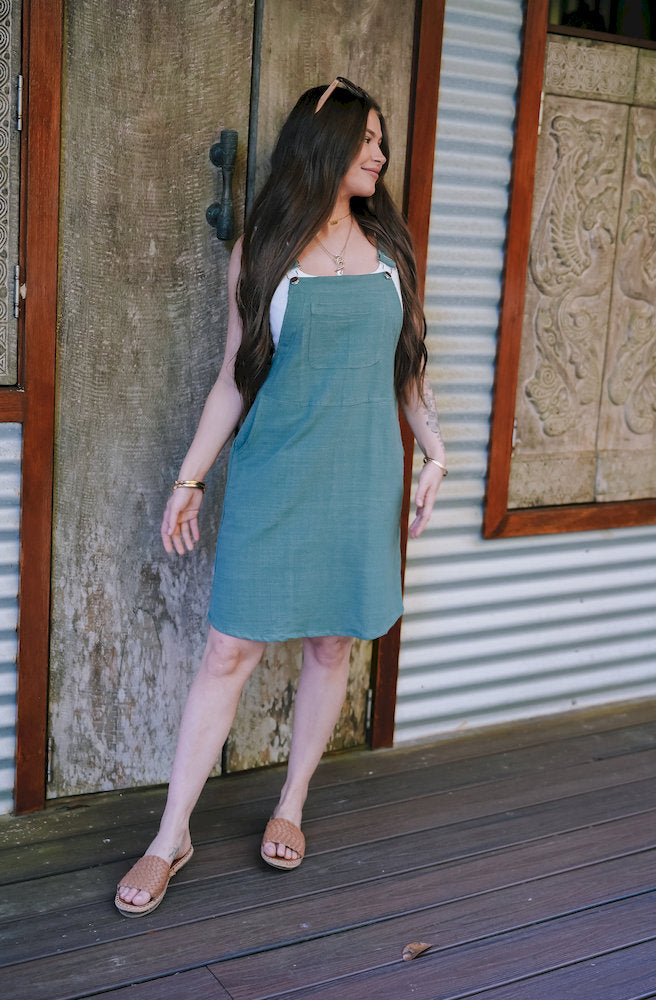 Gypsy Thread Pinafore Mid Short Green textured cotton pinafore in sage green with relaxed fit and practical pocket details