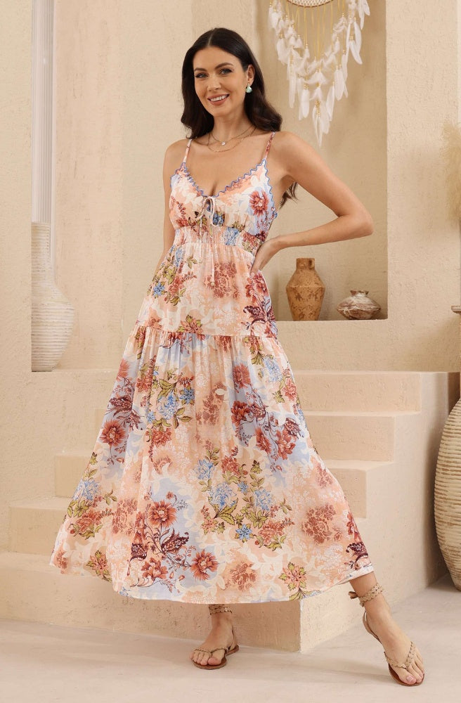 Iris Garden Maxi Dress in a romantic floral rayon print with adjustable straps and flowing tiered skirt
