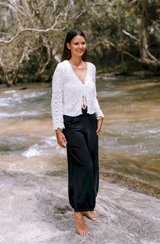 Isadora white crochet cardigan side view textured sleeve