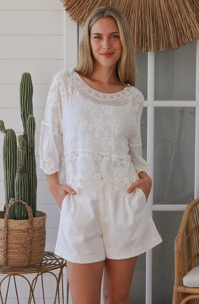 Ivory Daydream Lace Top with embroidered lace and white shorts front view