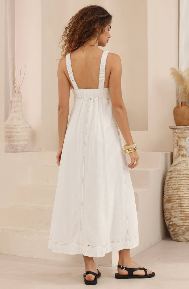 Back view of the Ivory Daydream Maxi Dress showing the wide shoulder straps, relaxed silhouette and contrast stitching.