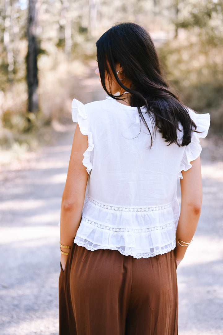 Ivory Pleated Peplum Top