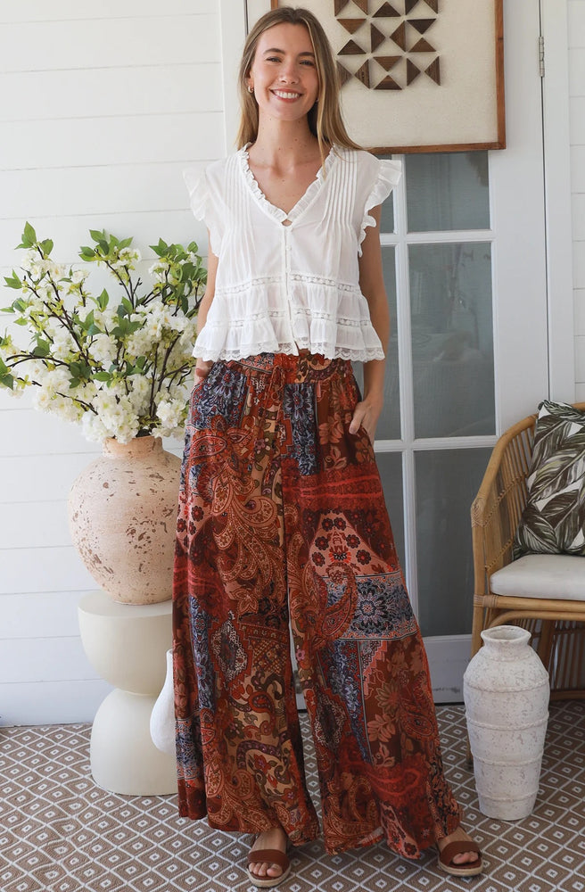 Ivory Pleated Peplum Top