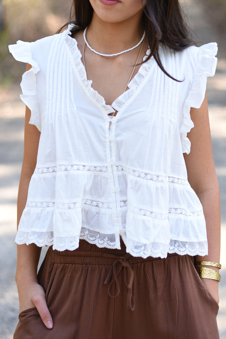 Ivory Pleated Peplum Top