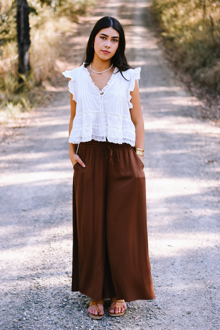 Ivory Pleated Peplum Top