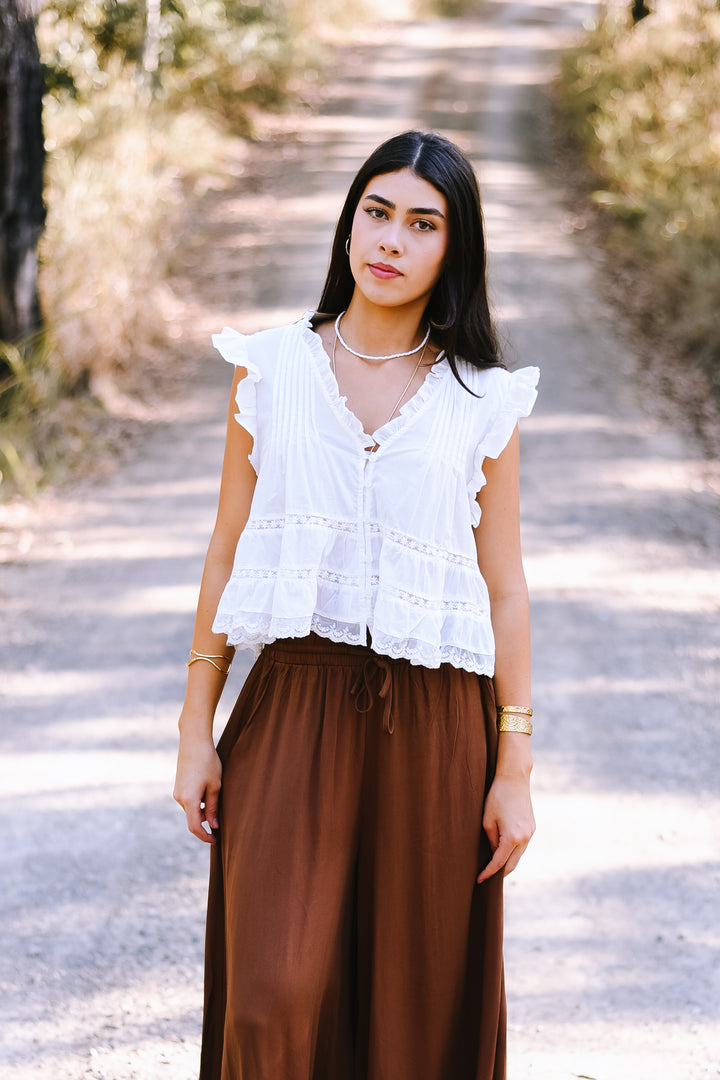 Ivory Pleated Peplum Top