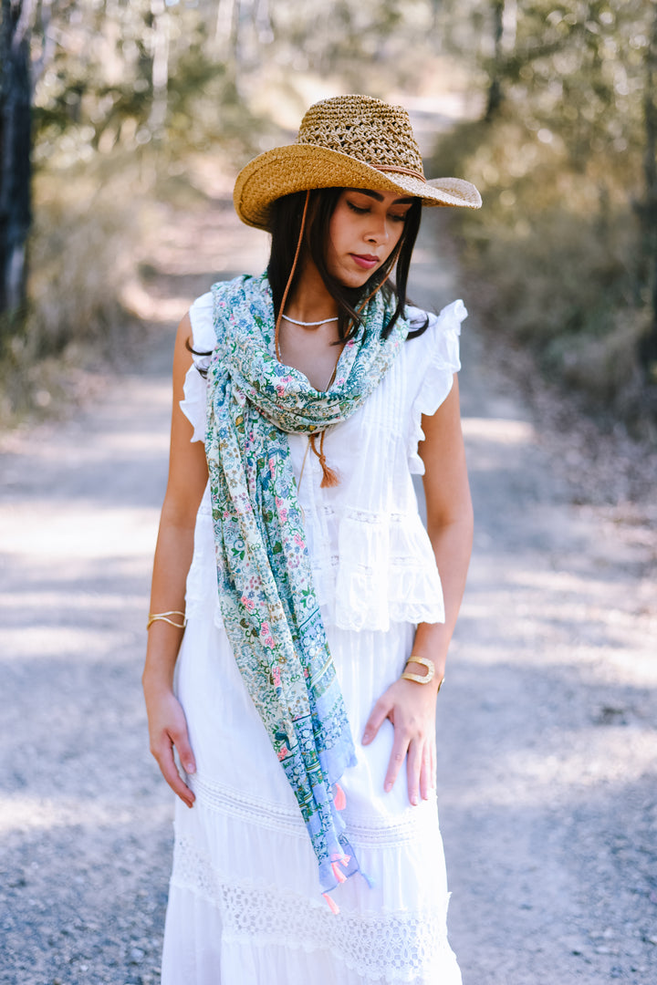 Close-up of the Mint Meadow Scarf showcasing its intricate botanical print in soft pastel and earthy tones.