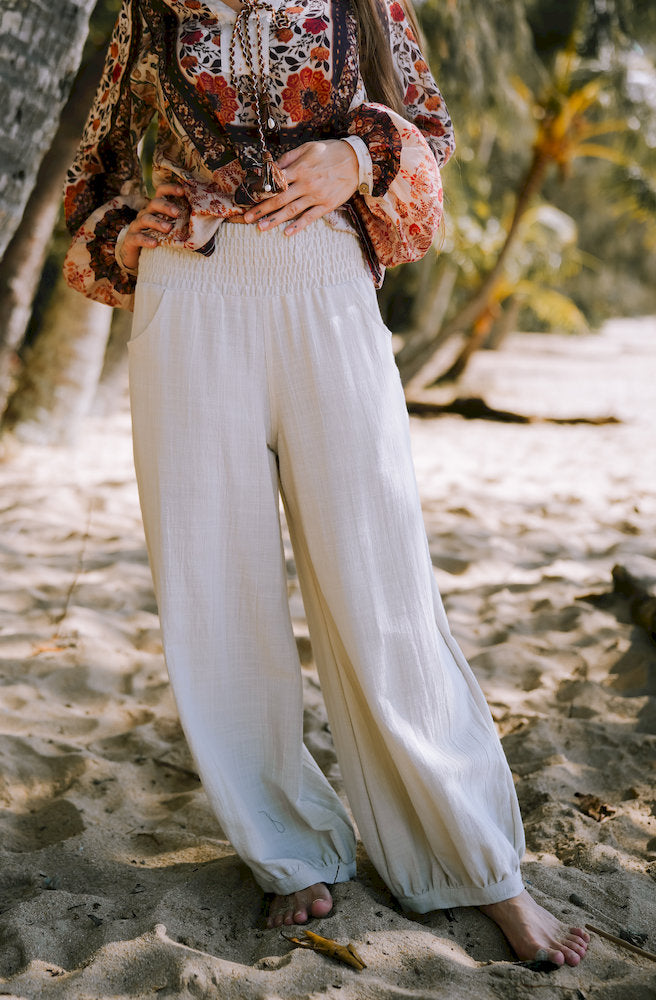 Women's Kesh Pants Cream featuring lightweight textured cotton, wide-leg silhouette and functional pockets.