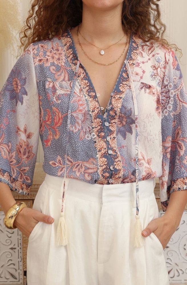 Relaxed floral blouse in lavender and blush tones