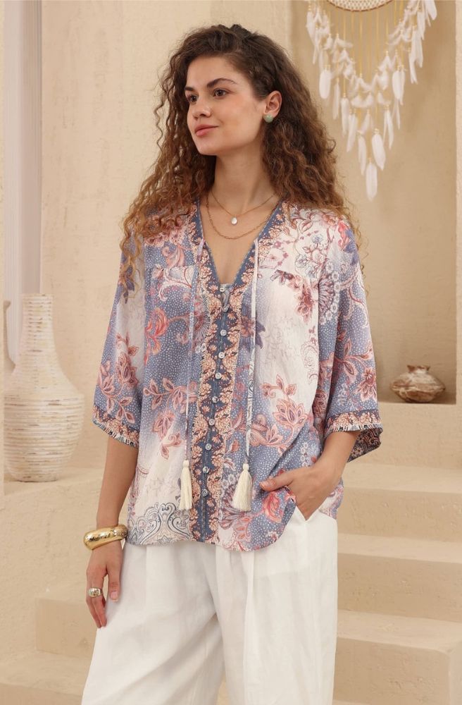 Relaxed floral blouse in lavender and blush tones