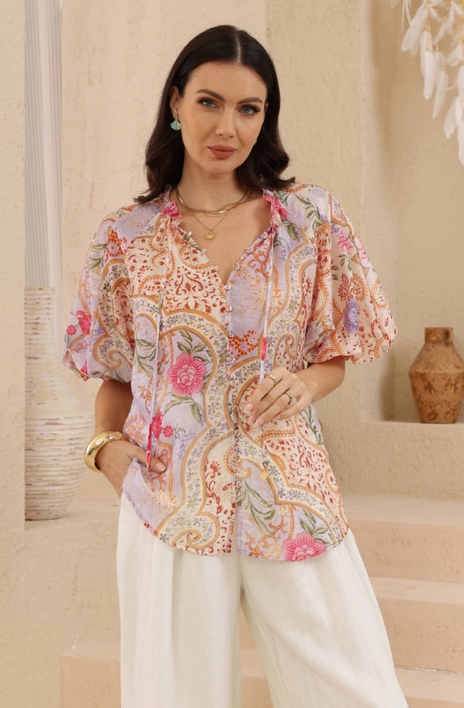 Lilac floral paisley blouse with pink flowers, relaxed sleeves and button-front neckline