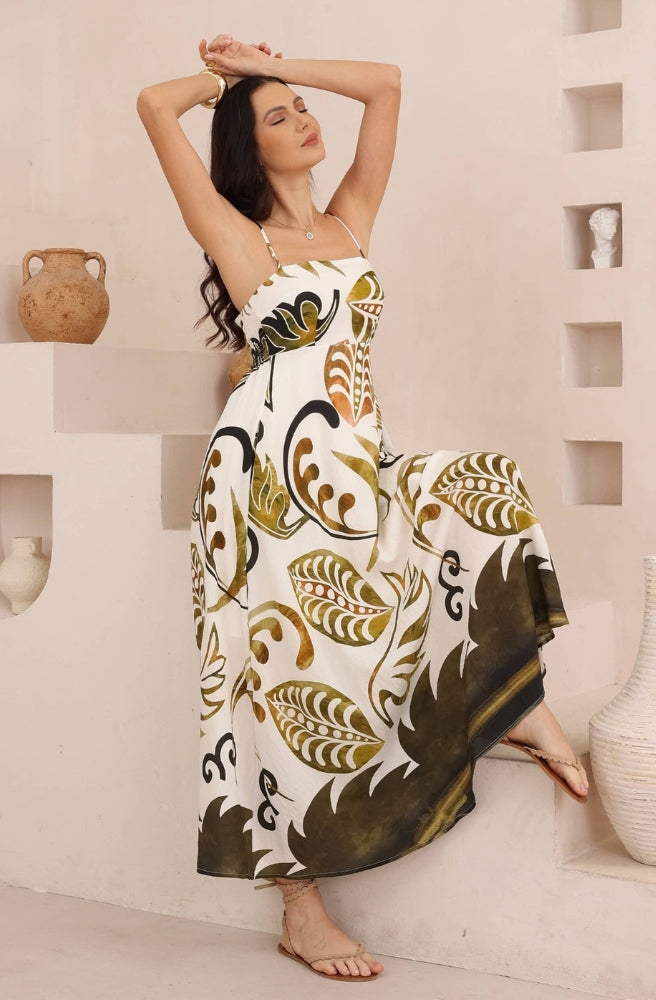 Olive Oasis Strappy Maxi Dress featuring an ivory base, olive and caramel botanical print, square neckline and flowing skirt.