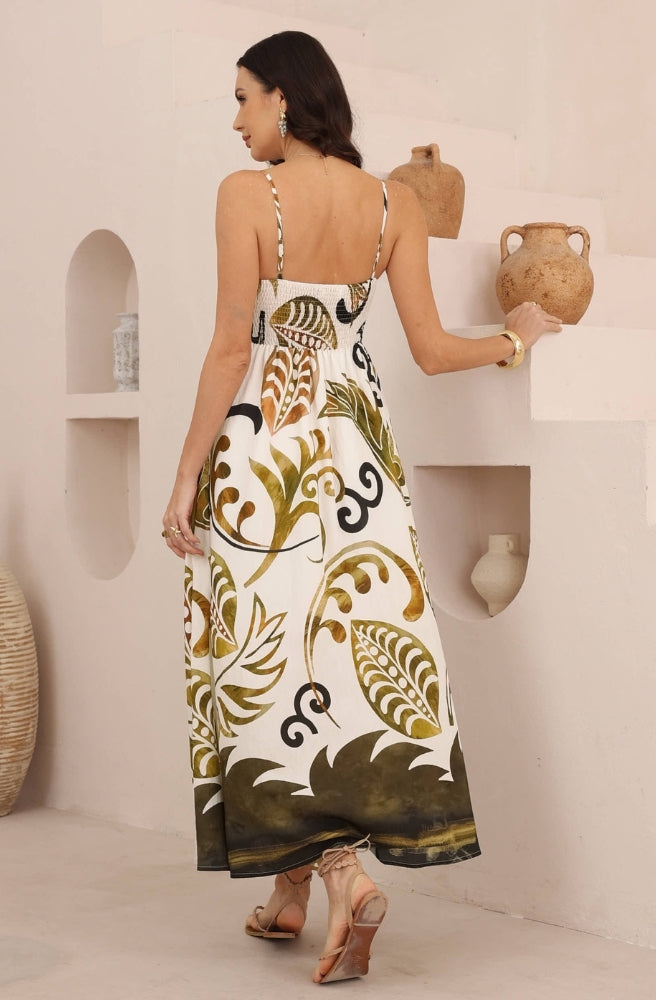 Back view of the Olive Oasis Strappy Maxi Dress showing the spaghetti straps, gathered bodice and dark border hem.