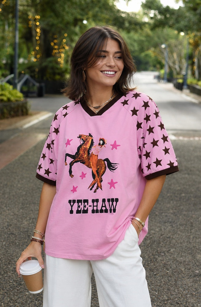 Pink Rodeo Yeehaw Tee with cowgirl and horse graphic and star-print sleeves