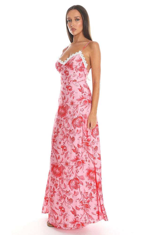 Rosie Bloom Maxi Dress in pink and red floral print with lace-trimmed neckline and flowing maxi skirt