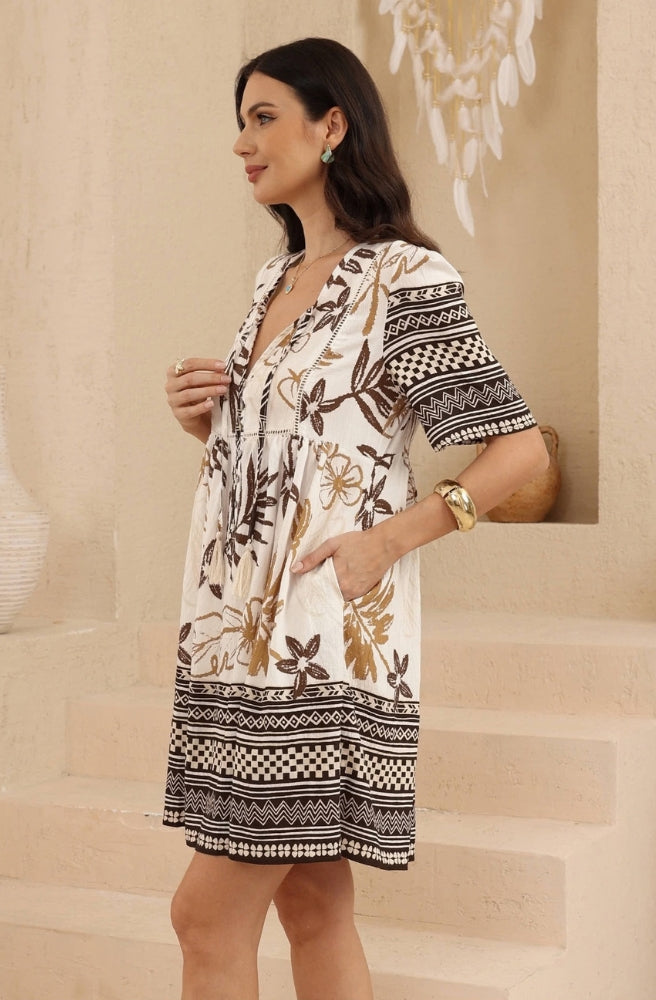Sahara Botanical mini dress in cream, brown and ochre botanical print