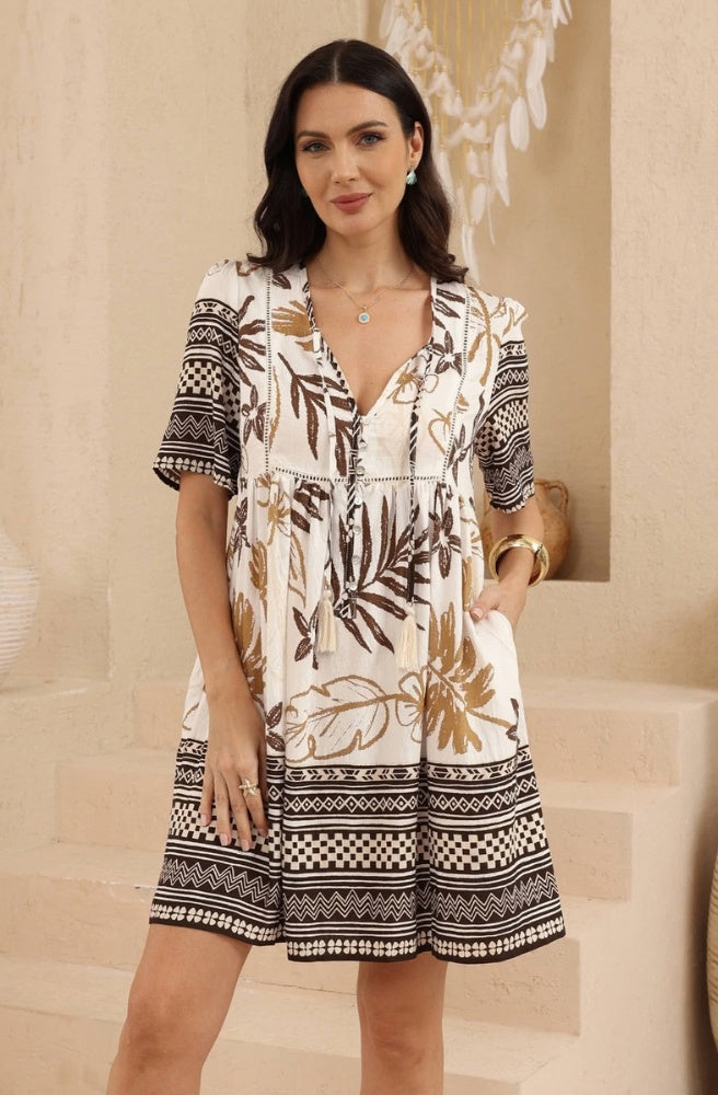 Sahara Botanical mini dress with earthy floral and foliage print