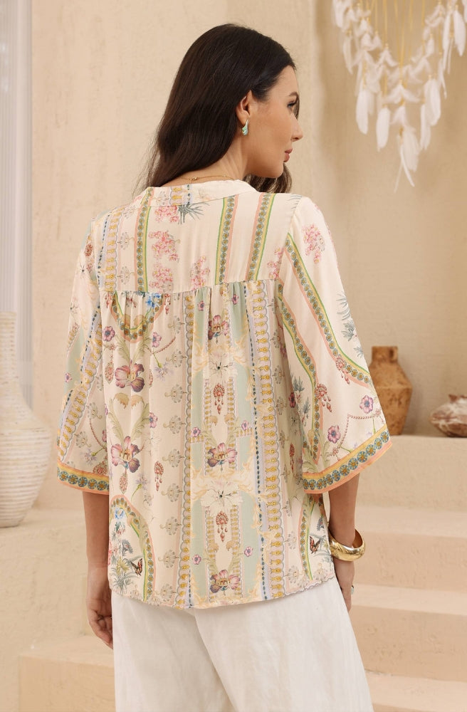Solana Floral Kimono Top featuring a relaxed fit, V-neckline, tassel ties and decorative border detailing