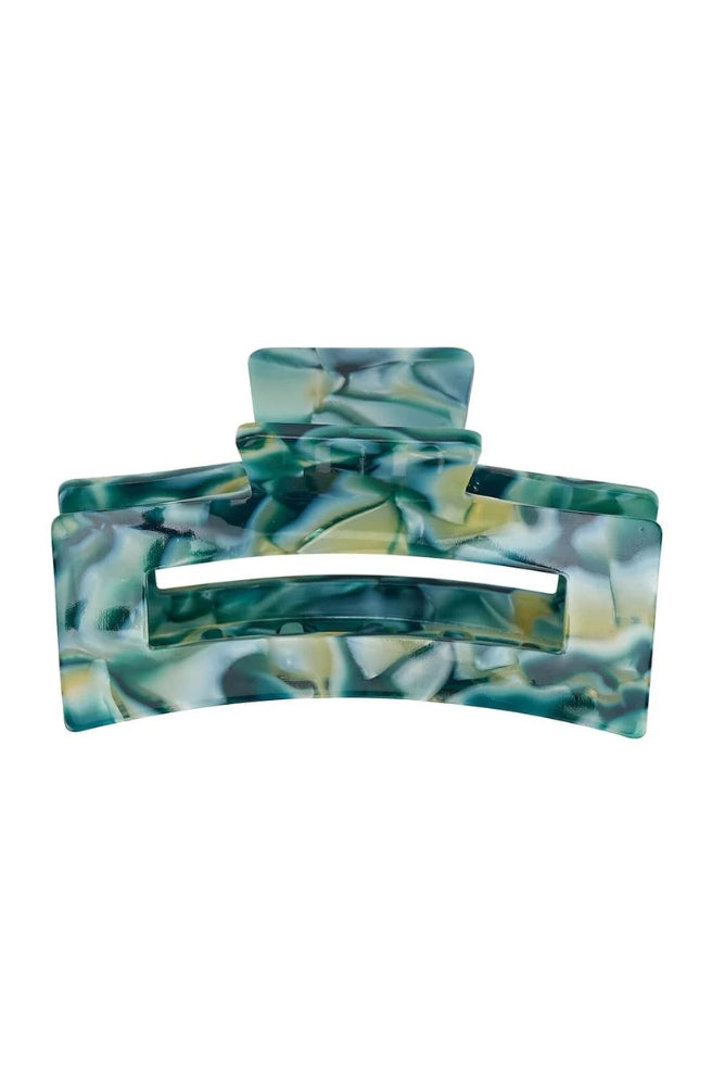 Tamed Hair Claw – Malachite featuring a marbled green and teal acetate design.