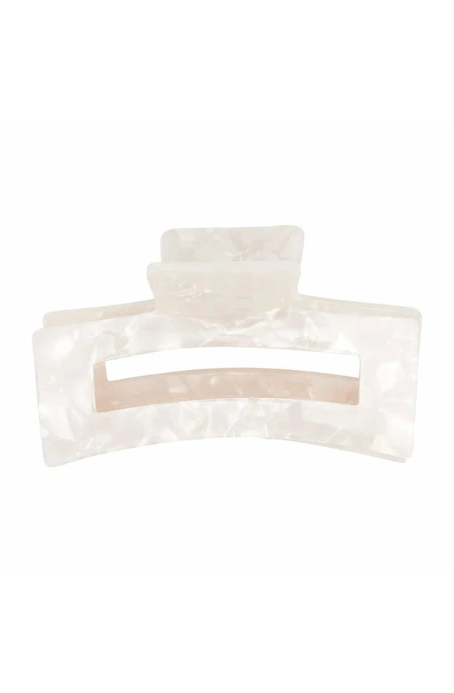 Tamed Hair Claw – Pearl featuring an elegant pearl-inspired finish.