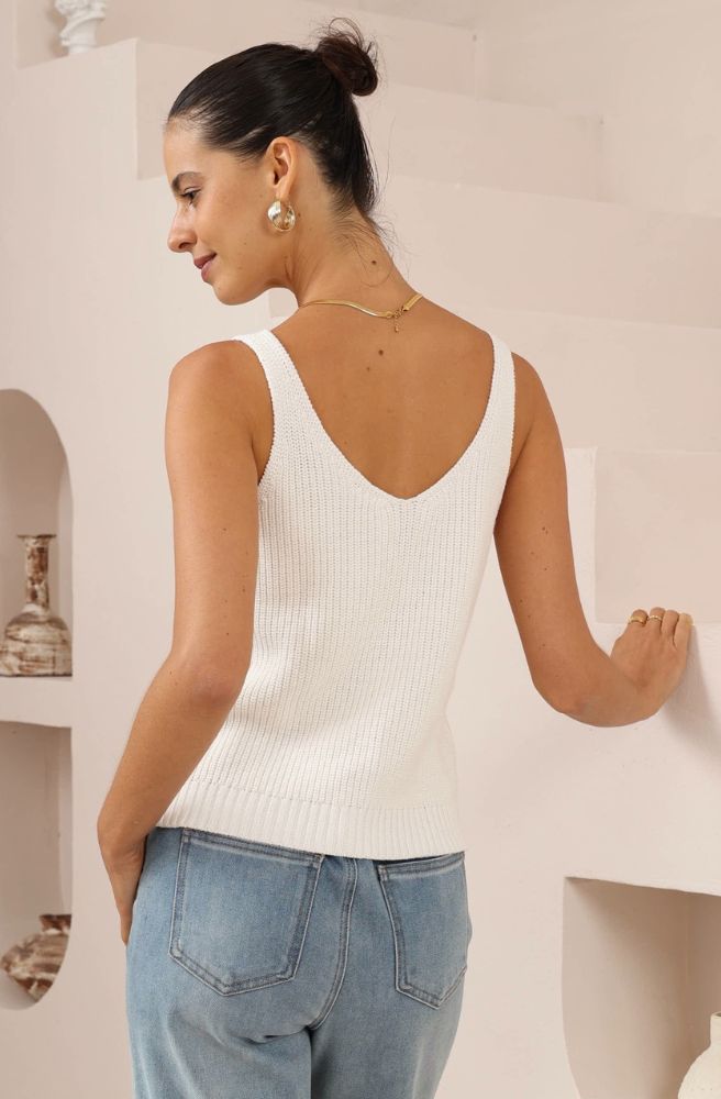 White Sands Knit Cami white sleeveless knit top styled with blue wide leg pants